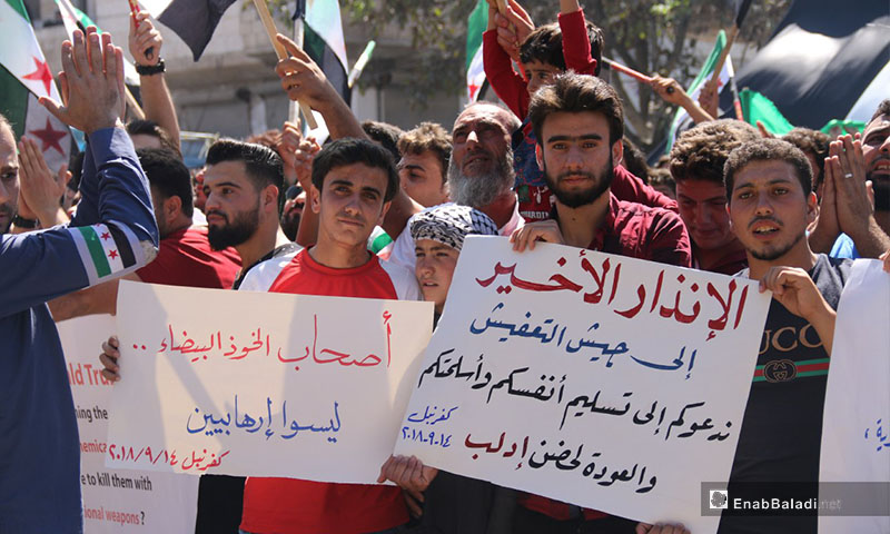 مظاهرات تنادي بأهداف الثورة السورية في مدينة كفرنبل بريف إدلب - 14 أيلول 2018 (عنب بلدي)