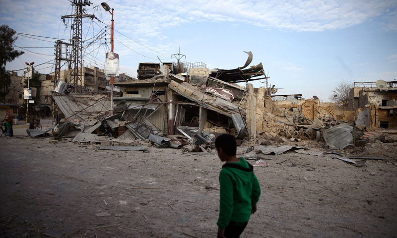 مبان مدمرة في الغوطة شرق العاصمة دمشق (رويترز)
