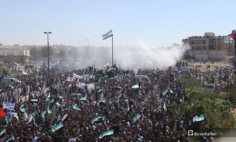 مظاهرات تنادي بأهداف الثورة السورية في مدينة معرة النعمان بريف إدلب - 14 أيلول 2018 (عنب بلدي)