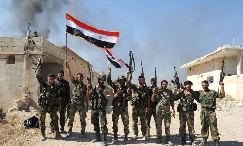 عناصر من قوات الأسد في حماة (AFP)
