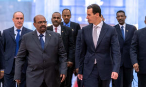 الرئيس السوداني عمر البشير في أثناء زيارته إلى دمشق للقاء بشار الأسد - كانون الأول 2018 (رئاسة الجمهورية)