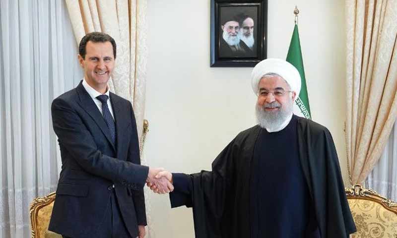 لقاء بشار الأسد والرئيس الإيراني حسن روحاني في طهران- 25 شباط 2019 (إرنا)