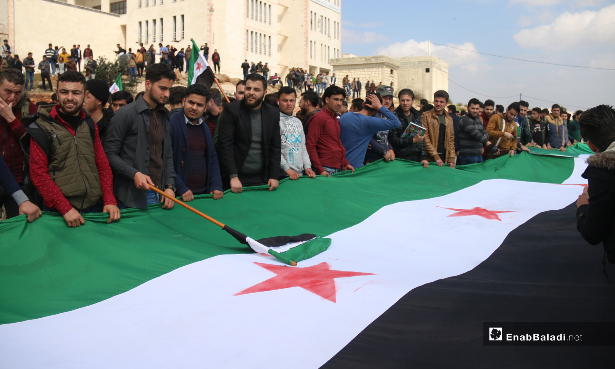 مظاهرة لطلاب جامعة إدلب بمناسبة الذكرى الثامنة للثورة السورية في إدلب - 18 من آذار 2019 (عنب بلدي)