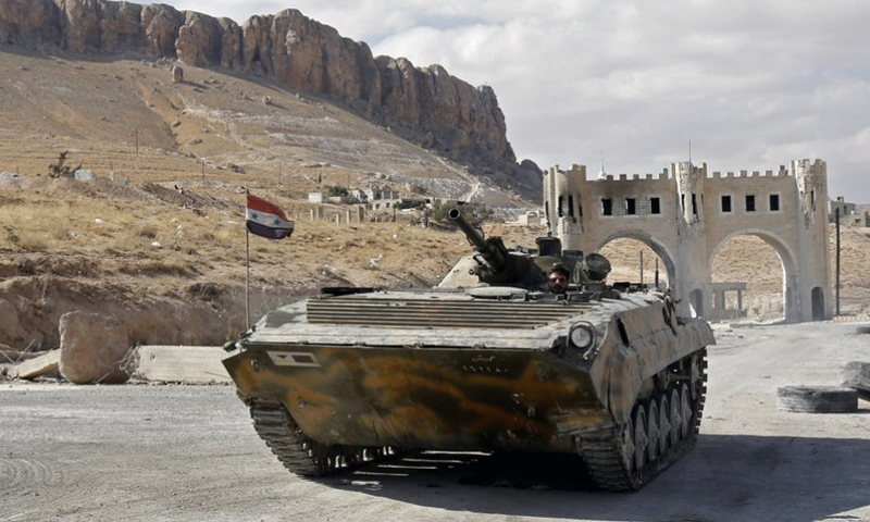سيطرت قوات الأسد على منطقة معلولا في القلمون-14 من نيسان 2014 (AFP)
