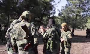 مقاتلين من هيئة تحرير الشام في محافظة إدلب (وكالة إباء)