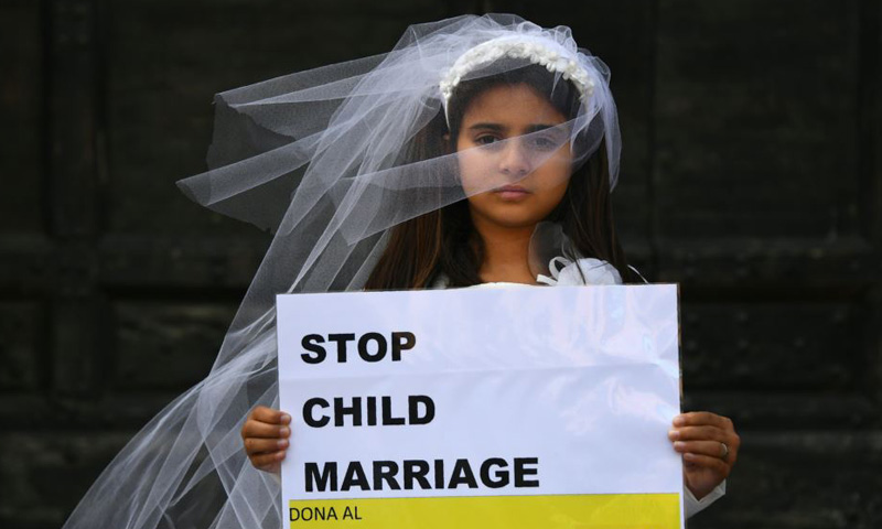 صورة من حملة لمنظمة العفو الدولية ضد زواج القاصرات، وكالة الصحافة الفرنسية، 2019