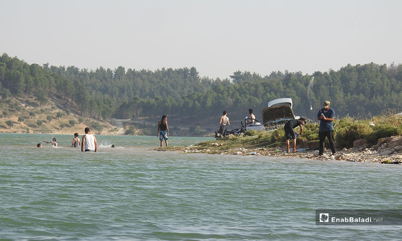  صيد السمك في بحيرة ميدانكي بمدينة عفرين شمالي حلب - 11 من حزيران 2019 (عنب بلدي)