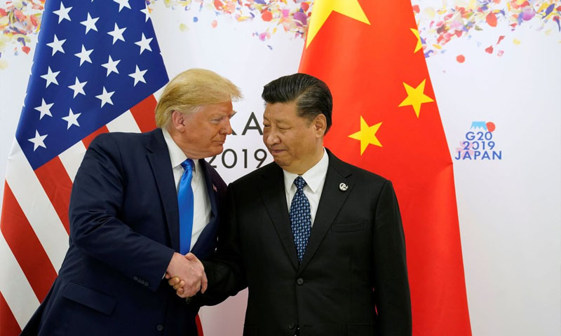 الرئيسان الصيني والأمريكي خلال قمة "مجموعة العشرين"- 29 حزيران 2019 (رويترز)