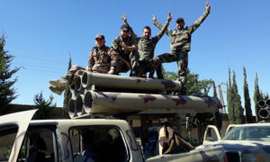قوات الأسد أثناء توجههم إلى جبهات ريفي حماة في حزيران 2019 (شبكة حمص الإخبارية الأولى)
