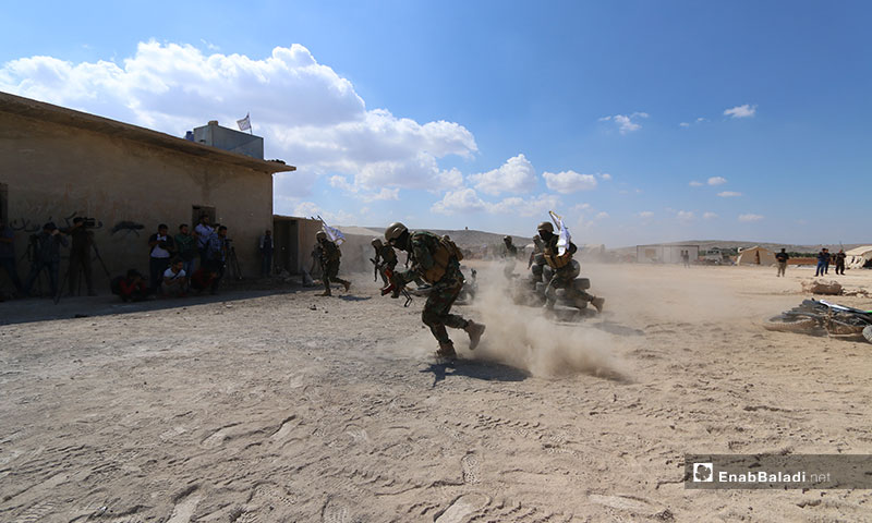 دورة عسكرية ضمن معسكر الشهيد عبد الباسط الساروت في منطقة كلبيت على الحدود السورية التركية - 15 من تموز 2019 (عنب بلدي)
