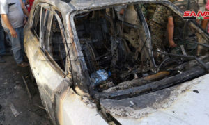 سيارة تعرضت لانفجار عبوة ناسفة في حي القدم وسط مدينة دمشق 22 تموز 2019 (وكالة سانا)