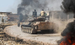 دبابة تابعة للجبهة الوطنية للتحرير المدعومة من تركيا في محافظة حماة- 6 حزيران 2019 (عمر حاج قدور AFP)
