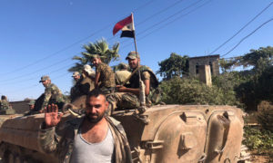 عناصر من قوات النظام السوري في قرية الزكاة بريف حماة (oleg blokhin)