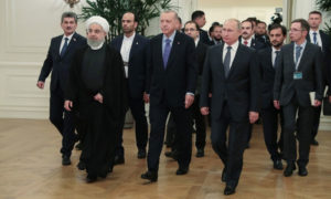 الرئيس الروسي، فلاديمير بوتين، والرئيس التركي رجب طيب أردوغان، والإيراني حسن روحاني في قمة ثلاثة في أنقرة- 16 من أيلول 2019 (الأناضول)
