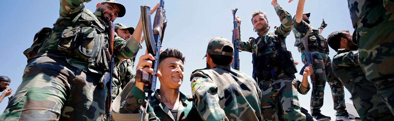 عناصر من قوات الأسد خلال الحملة العسكرية في القنيطيةر - تموز 2018 (رويترز)
