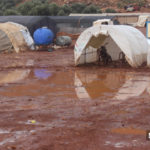 أمطار غزيرة تقطع الطريق إلى مخيم "شام 2" جنوب غرب كللي بريف إدلب - 5 من كانون الأول 2019 (عنب بلدي)