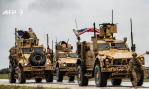 دورية عسكرية أمريكية عند ناحية تل تمر بريف الحسكة - 24 كانون الثاني 2020 (AP)