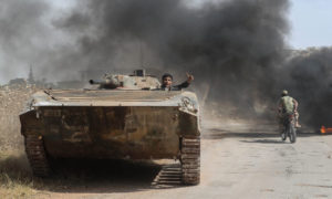 دبابة تابعة للجبهة الوطنية للتحرير في ريف حماة- 6 من حزيران 2019 (AFP)
