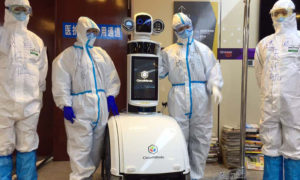 روبوتات تحل محل فريق طبي في ووهان بالصين (NEWS SCICENTIST)