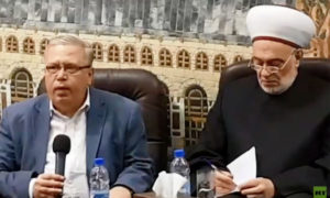 وزير العدل السابق نجم الأحمد خلال محاضرة في مجمع الفتح الإسلامي - 7 من آذار 2020 (روسيا اليوم)