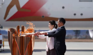 الشعلة الأولمبية في اليابان 20 من آذار 2020 (نيويورك بوست)