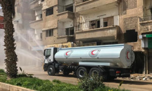 عمليات تعقيم الهلال الأحمر السوري في ريف دمشق - 28 آذار 2020 (الهلال الأحمر)