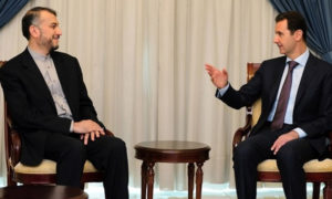 رئيس النظام السوري بشار الأسد يجلس مع المساعد الخاص لرئيس مجلس الشورى الإيراني، حسين أمير عبد اللهيان- (abna24)