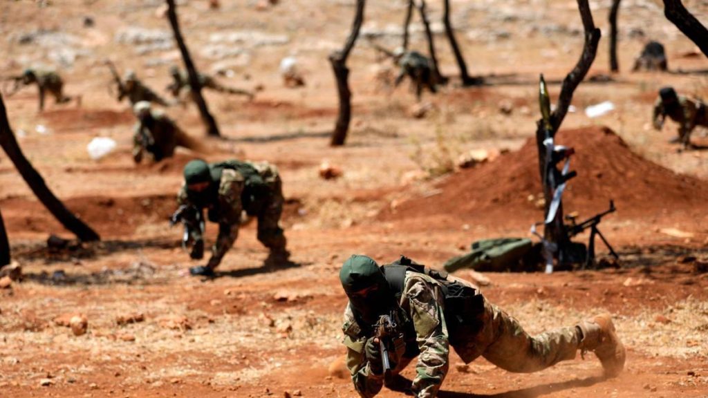 تدريب لمقاتلين في هيئة تحرير الشام - 2018 (AFP)