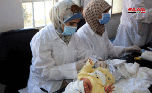 ممرضات في مناطق سيطرة النظام خلال حملة تلقيح - 15 حزيران 2020 (سانا)