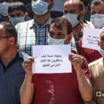 وقفة احتجاجية نظمتها نقابتي الأطباء والصيادلة جراء استهداف الصيدلي أحمد الحامد برصاص مجهولين في مدينة الباب بريف حلب الشمالي - 13 من تموز 2020 (عنب بلدي / عاصم الملحم)