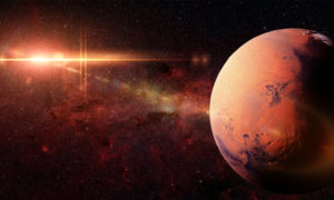 صورة لكوكب الأرض مع إشعاع شمسي- (Shutterstock)