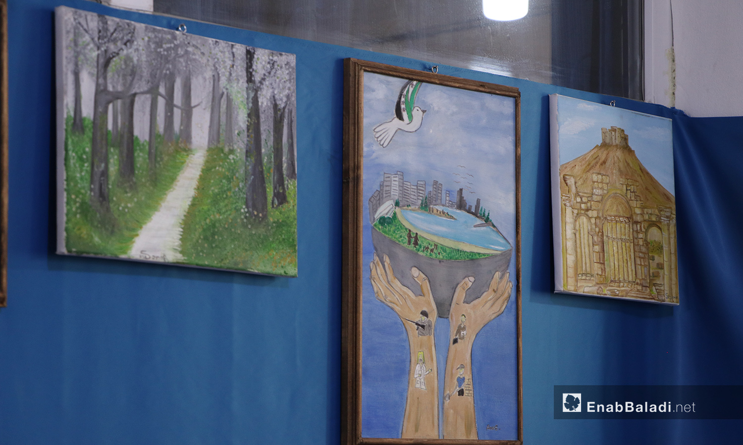 لوحات المشاركين بمعرض الرسم في مدينة الباب - 22 أيلول 2020 (عنب بلدي/ عاصم الملحم)
