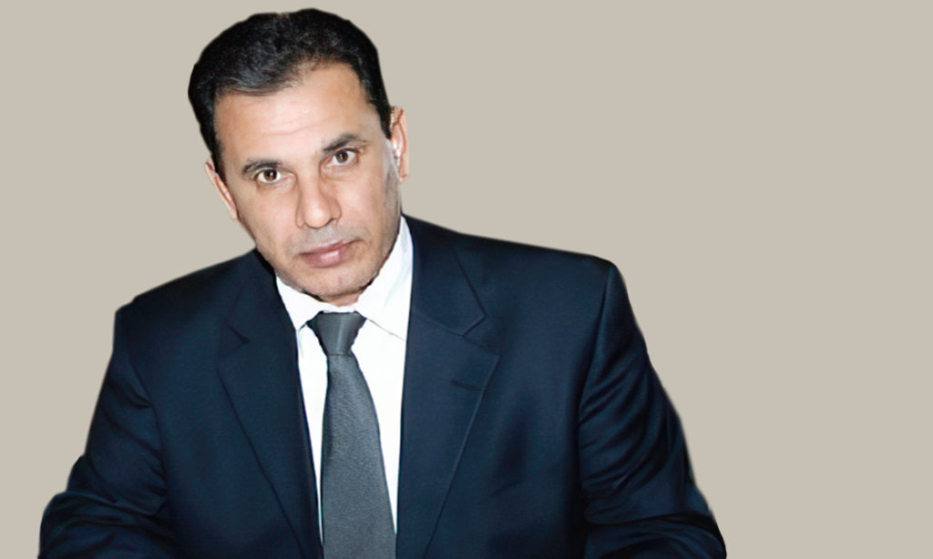 المدير العام الأسبق للهيئة العامة للإذاعة والتلفزيون السورية ممتاز الشيخ (تعديل عنب بلدي)