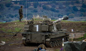 قوات الجيش الإسرائيلي بالقرب من الحدود الإسرائيلية السورية، في مرتفعات الجولان، 3 من كانون الثاني 2020. (Basel Awidat/Flash90)