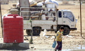 خزان مياه في مخيم عين عيسى شمال شرقي سوريا (UNICEF/Delil Souleiman)