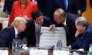 رؤوساء تركيا وأمريكا وكندا مع وزير الخارجية التركي في قمة العشرين بألمانيا عام 2017 (الرئاسة التركية)