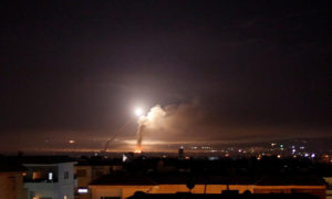منصات إطلاق صواريخ أرض جو لقوات النظام خلال محاولة التصدي لقصف إسرائيلي (رويترز)
