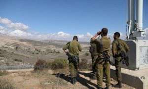 الجيش الإسرائيلي على الحدود مع الجولان السوري (thenationalnews)