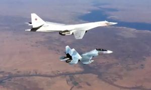 طائرة SU- 30 وتوبوليف 160 الروسية في سماء سوريا (سبوتنيك)