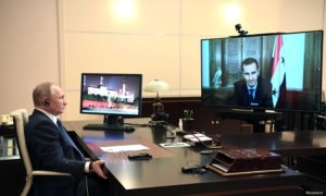 Russian President Vladimir Putin speaks with Syrian President Bashar al-Assad via a video conference call at the Novo-Ogaryovo state residence outside Moscow, Russia November 9, 2020. Sputnik/Aleksey Nikolskyi/Kremlin via REUTERS ATTENTION EDITORS - THIS IMAGE WAS PROVIDED BY A THIRD PARTY.