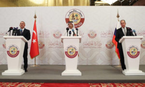 وزراء خارجية قطر وروسيا وتركيا في مؤتمر صحفي في الدوحة - 11 من آذار 2021 (الأناضول)
