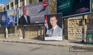 لوحات طرقية للمرشحي الانتخابات في شوارع حلب .أيار 2021 (عنب بلدي/ صابر الحلبي)