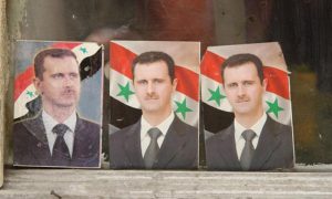 ملصقات دعائية لرئيس النظام السوري بشار الأسد (James Gordon/Flickr)