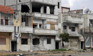 منازل مدمرة نتيجة قصف قوات النظام السوري على مراكز الاحتجاج في مدينة حمص وسط سوريا - 11 من شباط 2012 (فرانس برس)
