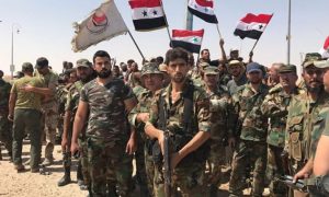 عناصر من قوات النظام والحزب القومي السوري في درعا (سبوتنيك)