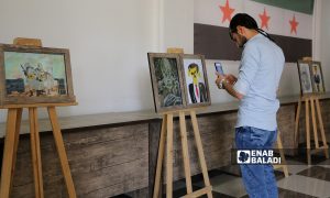 معرض فني إحياءً لذكرى مجزرة كيماوي الغوطة الشرقية في مدينة إعزاز - 21 آب 2021 (عنب بلدي - وليد عثمان)