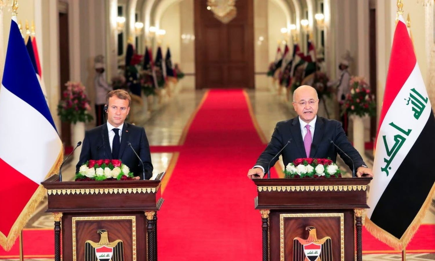 اجتماع الرئيس العراقي، برهم صالح، مع الرئيس الفرنسي، إيمانويل ماكرون، في بغداد، وكالة "واع"، 2021.