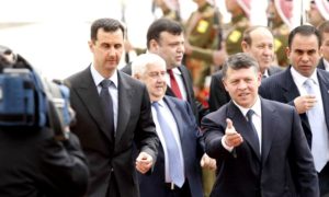 الملك الأردني عبد الله الثاني يستقبل رئيس النظام السوري بشار الأسد في عمان - 20 آذار 2009 (Getty)