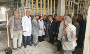 عمال مطحنة "تشرين" (وزارة التجارة السورية)