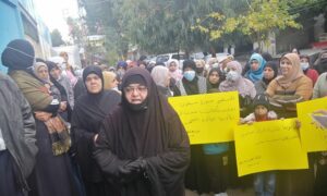 وقفة احتجاجية لفلسطينيي سوريا في لبنان أمام مكتب وكالة "أونروا"، مجموعة العمل من أجل فلسطينيي سوريا، 2021.